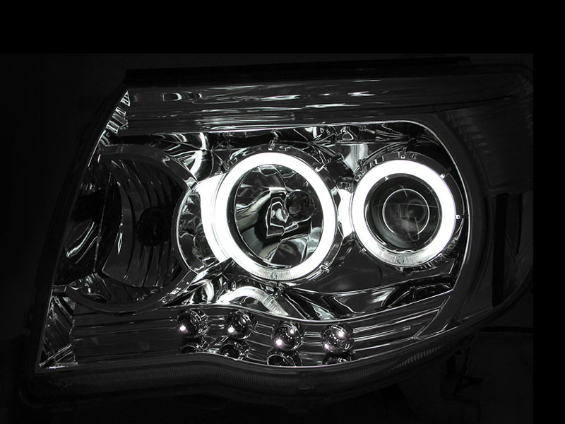 
                      
                        ANZO 2005-2011 Toyota Tacoma Projector Headlights w/ Halos Chrome
                      
                    