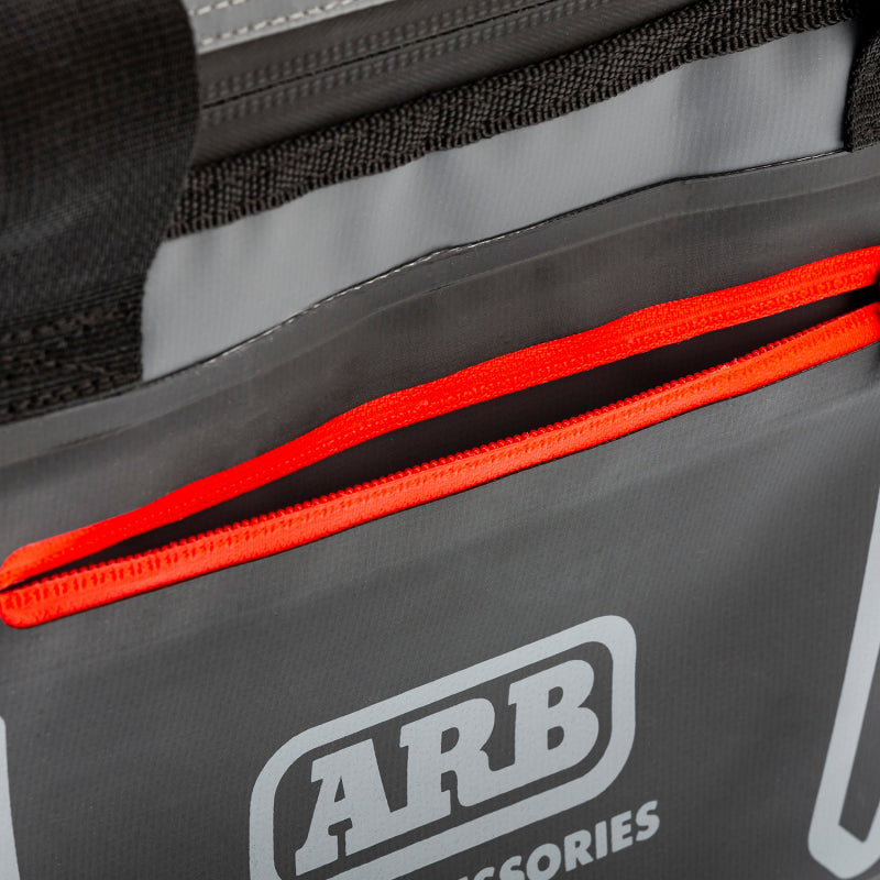 
                      
                        ARB Cooler Bag Charcoal w/ Red Highlights 15in L x 11in W x 9in H Holds 22 Cans
                      
                    