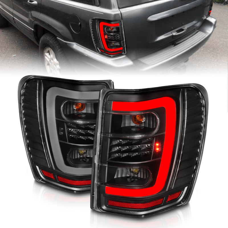 
                      
                        ANZO 1999-2004 Jeep Grand Cherokee LED Tail Lights w/ Light Bar Black Housing Clear Lens
                      
                    